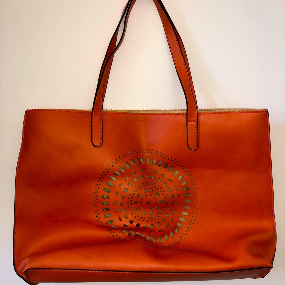 Neiman Marcus shoulder bag to brighten up your look.